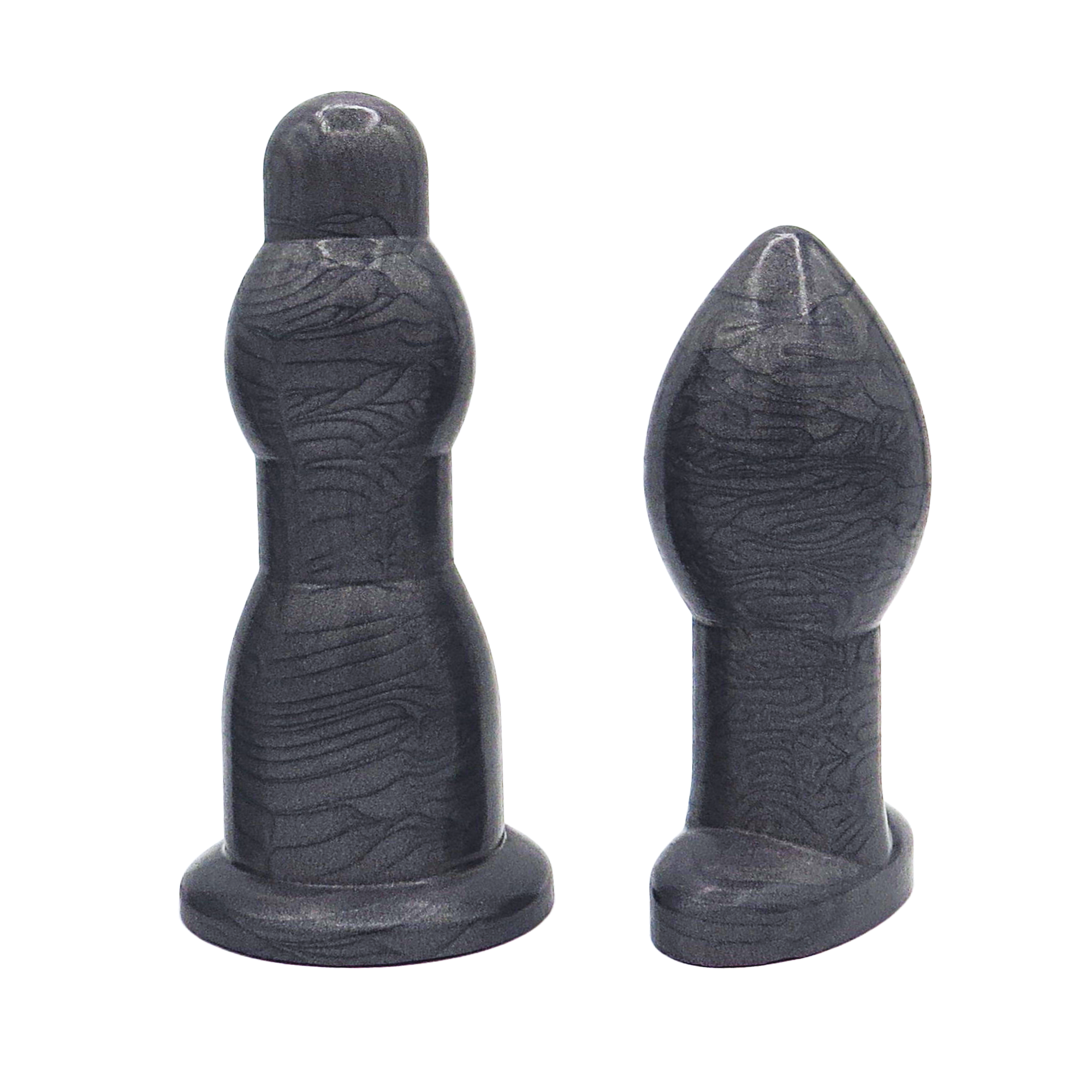 Image of a size 6 black anal dilation wand and butt plug