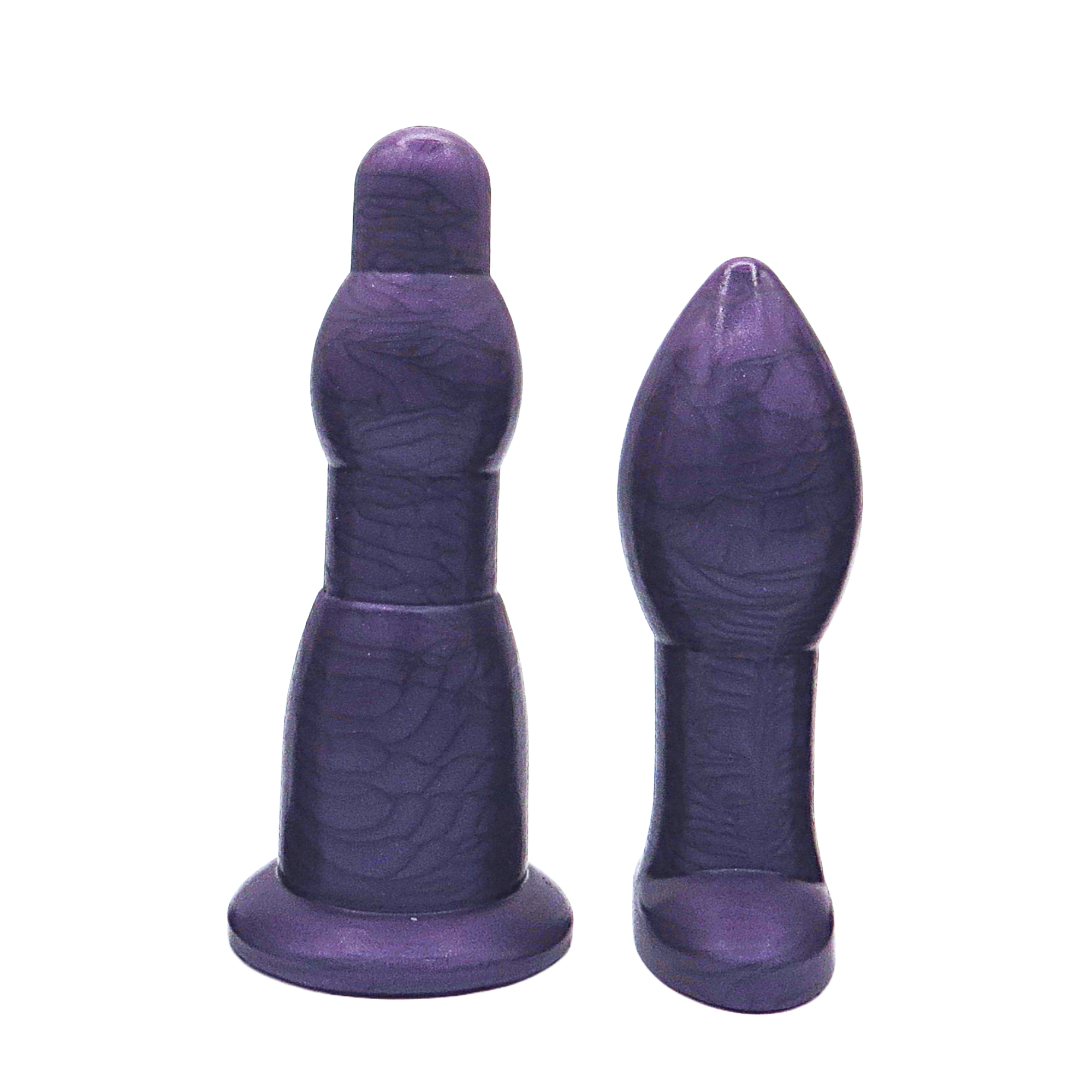 Image of size 4 purple anal dilation wand and butt plug