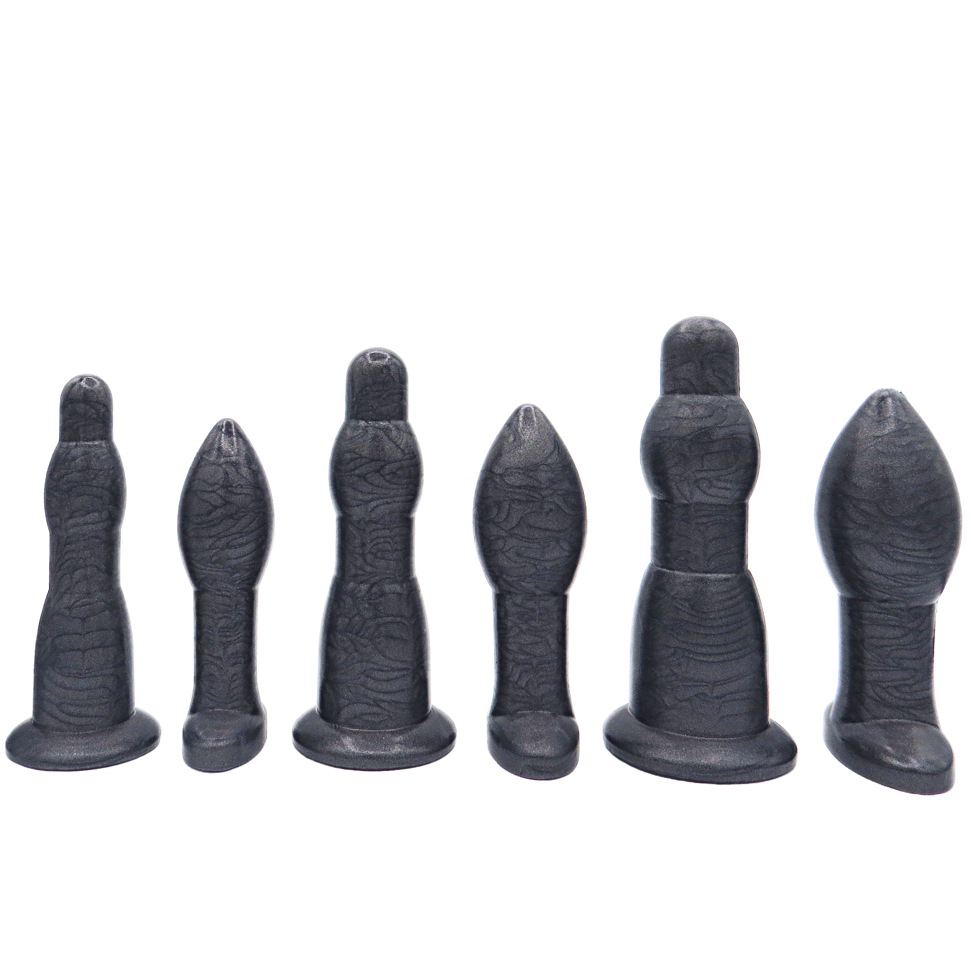 Image of a large black anal training set with 3 anal dilation wands and 3 butt plugs in increasing sizes