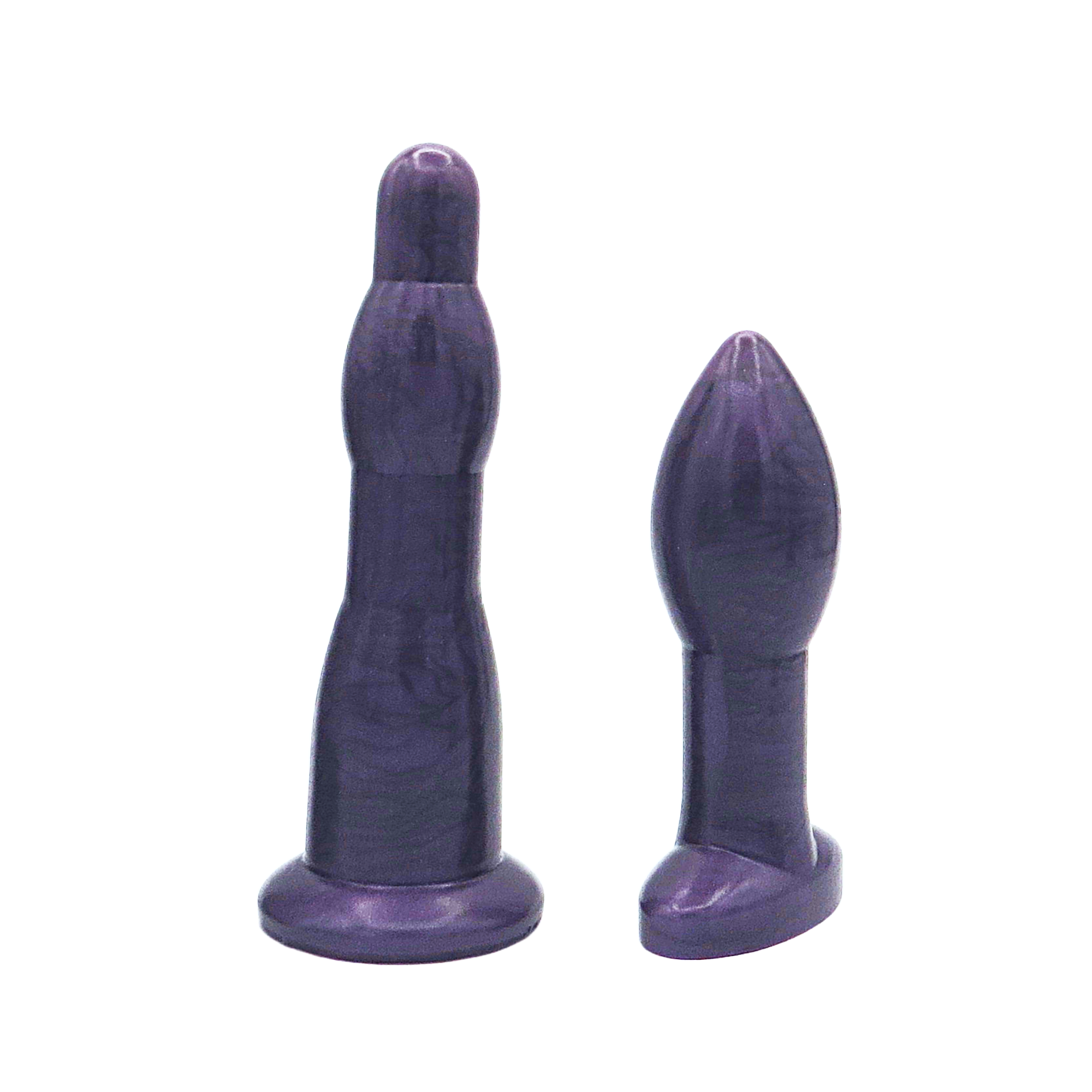 Image of a purple long anal dilation wand and butt plug