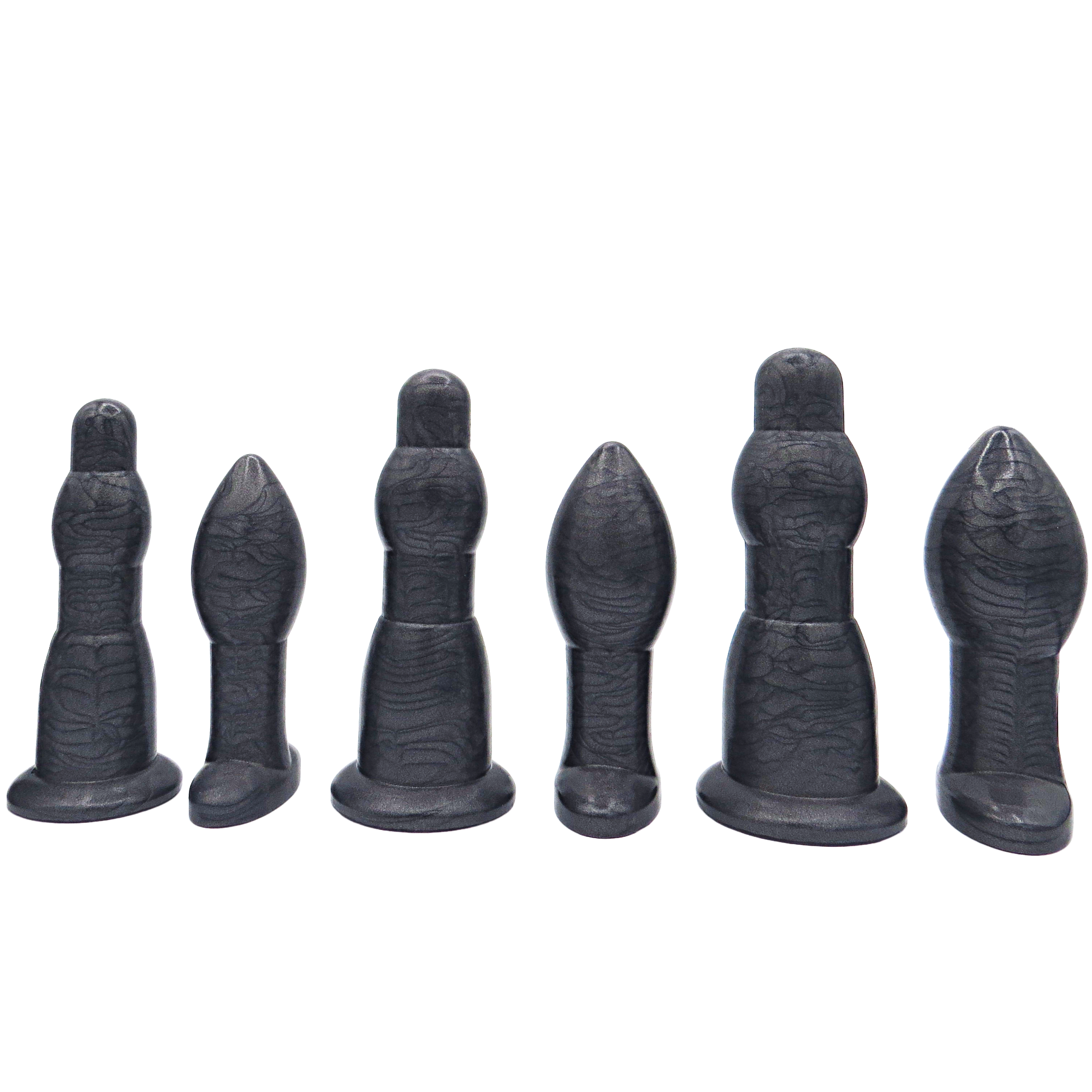 Image of an extra large black anal training set with 3 anal dilation wands and 3 butt plugs in increasing sizes